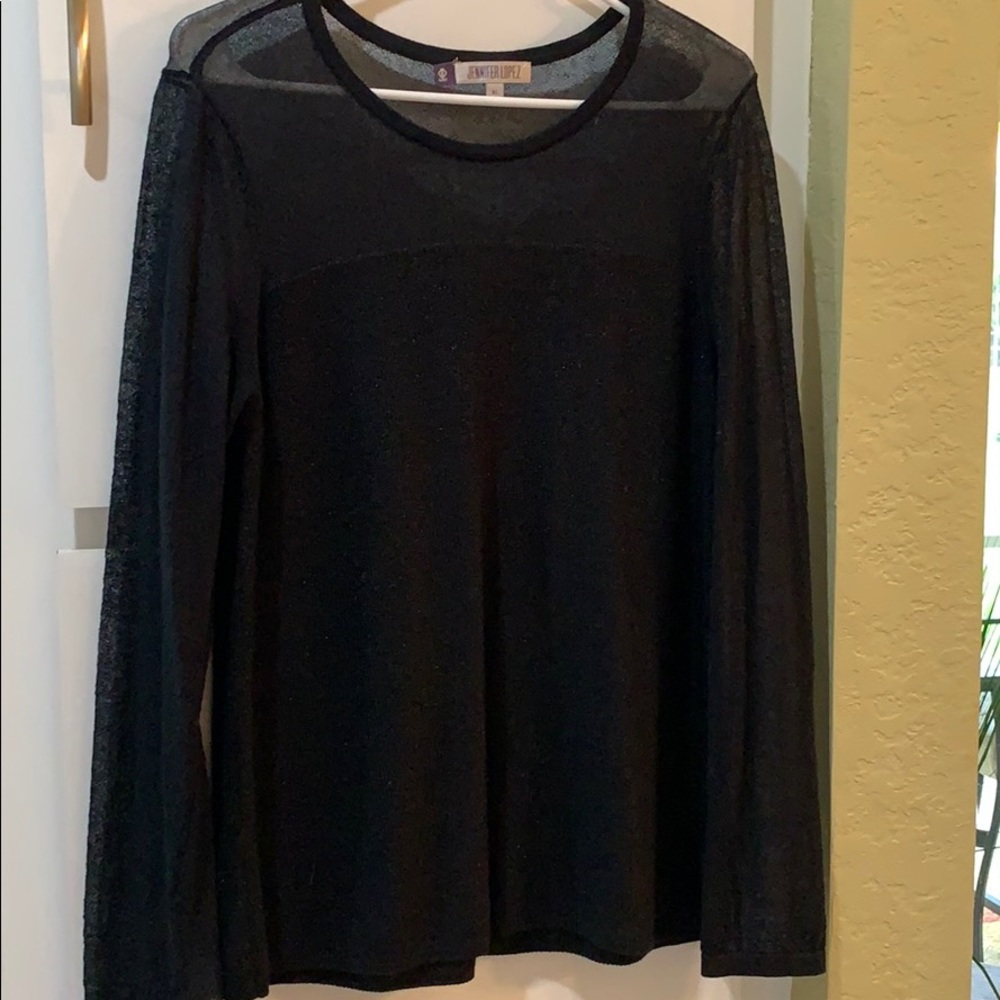Jennifer Lopez, extra large black sweater
